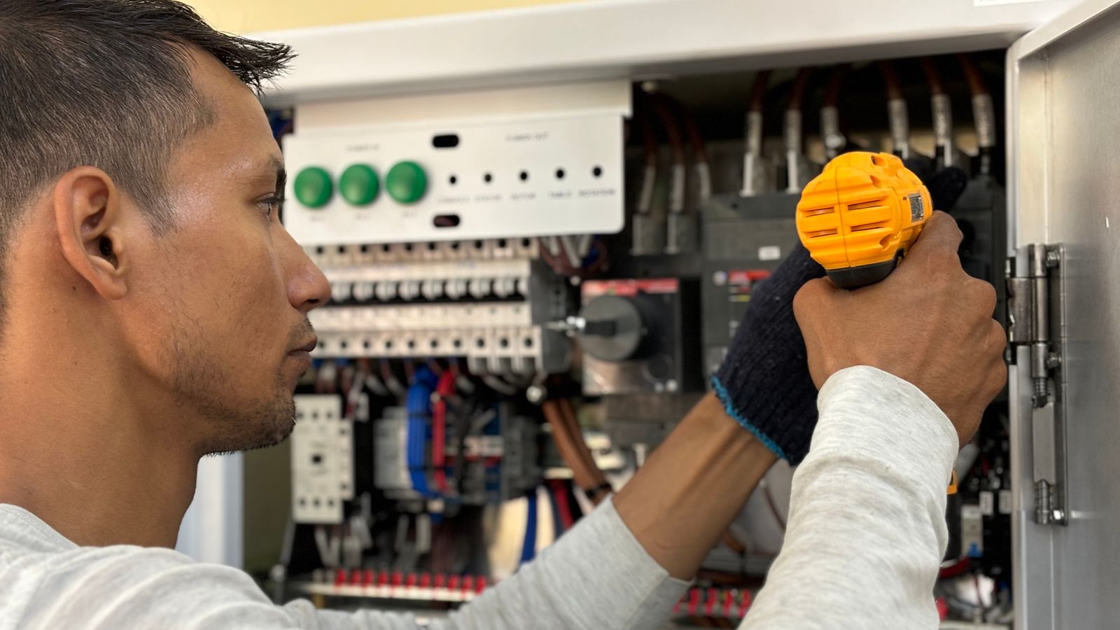 Electrician working on a distribution board